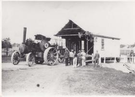 The time is 1930. The place is the road into Hall crossing Halls Creek. What is going on?