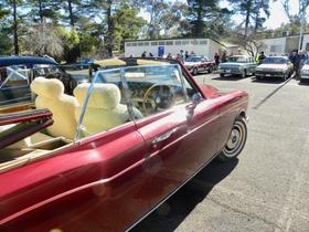 An eye-catching Rolls Royce convertible on playground duty 