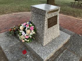 The wreath at the memorial cairn laid on behalf of the Friends of Hall School Museum & Heritage Centre