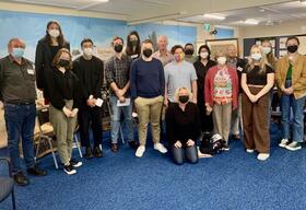 Dr Anna Edmundson (kneeling) and Museum studies students from the ANU